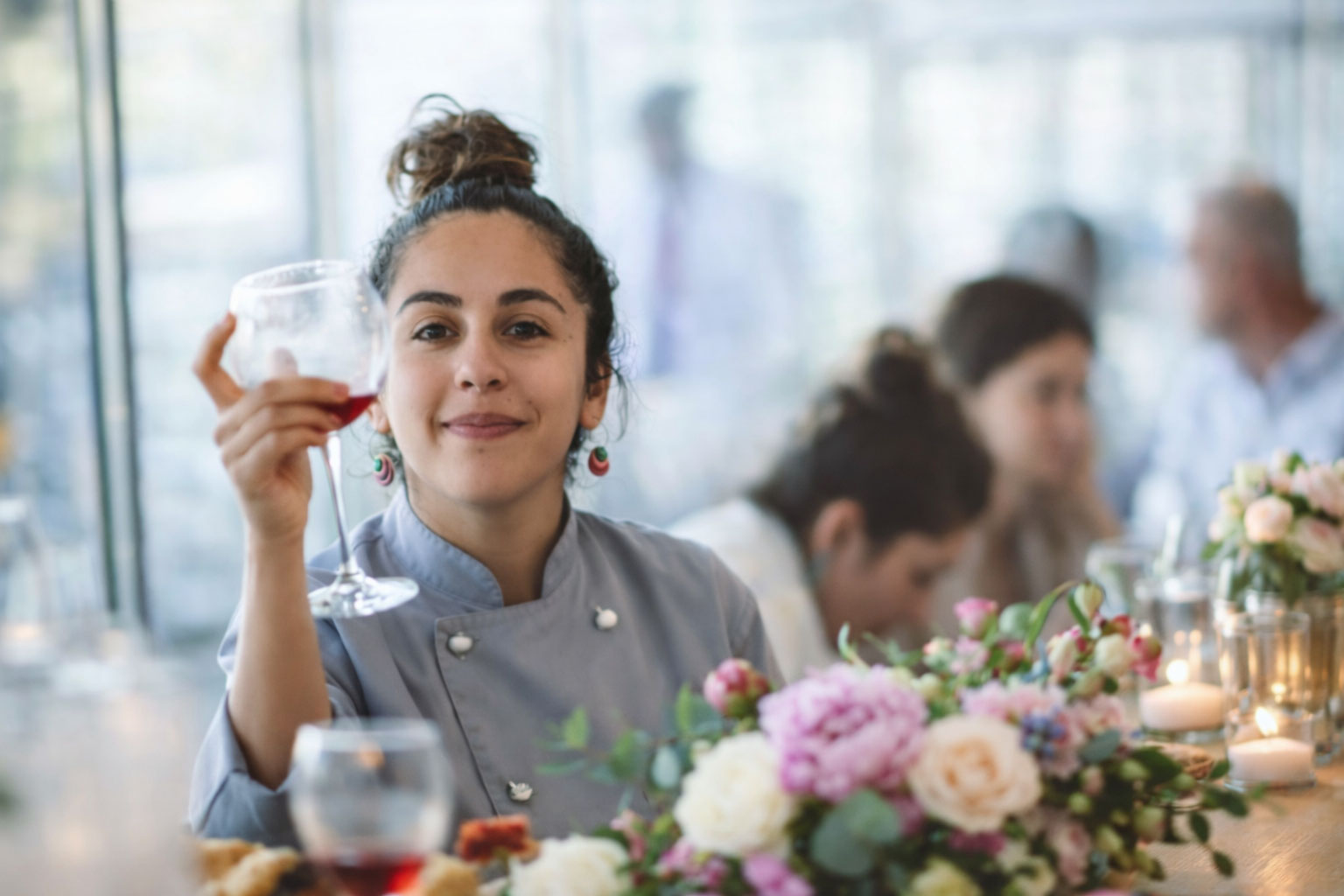 Melek Ozyavru private chef in Kas Antalya serving guests at an elegant dinner with catering and villa dining services